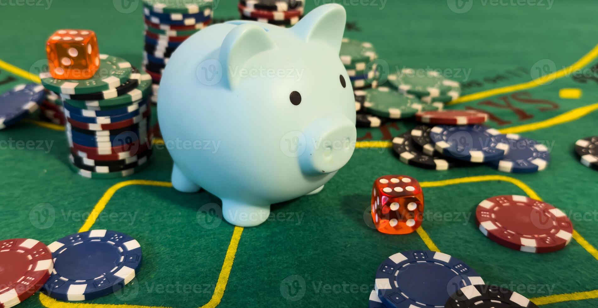 Piggy bank surrounded by a pile of assorted casino chips conceptual of success photo
