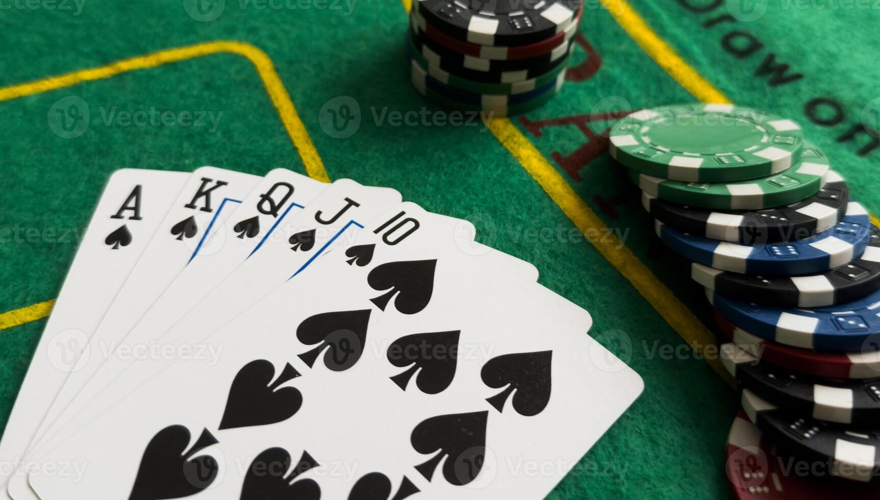 Chips are colored for poker and playing cards on the poker table. poker. casino. win. photo
