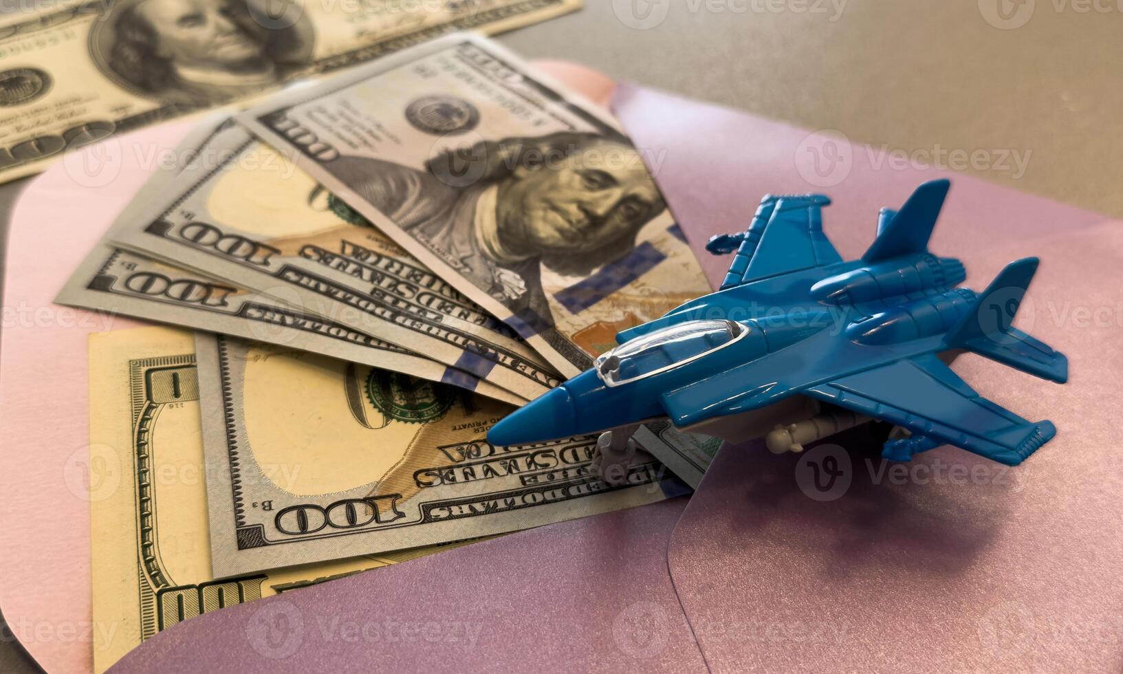 fighter plane and envelope with dollars photo