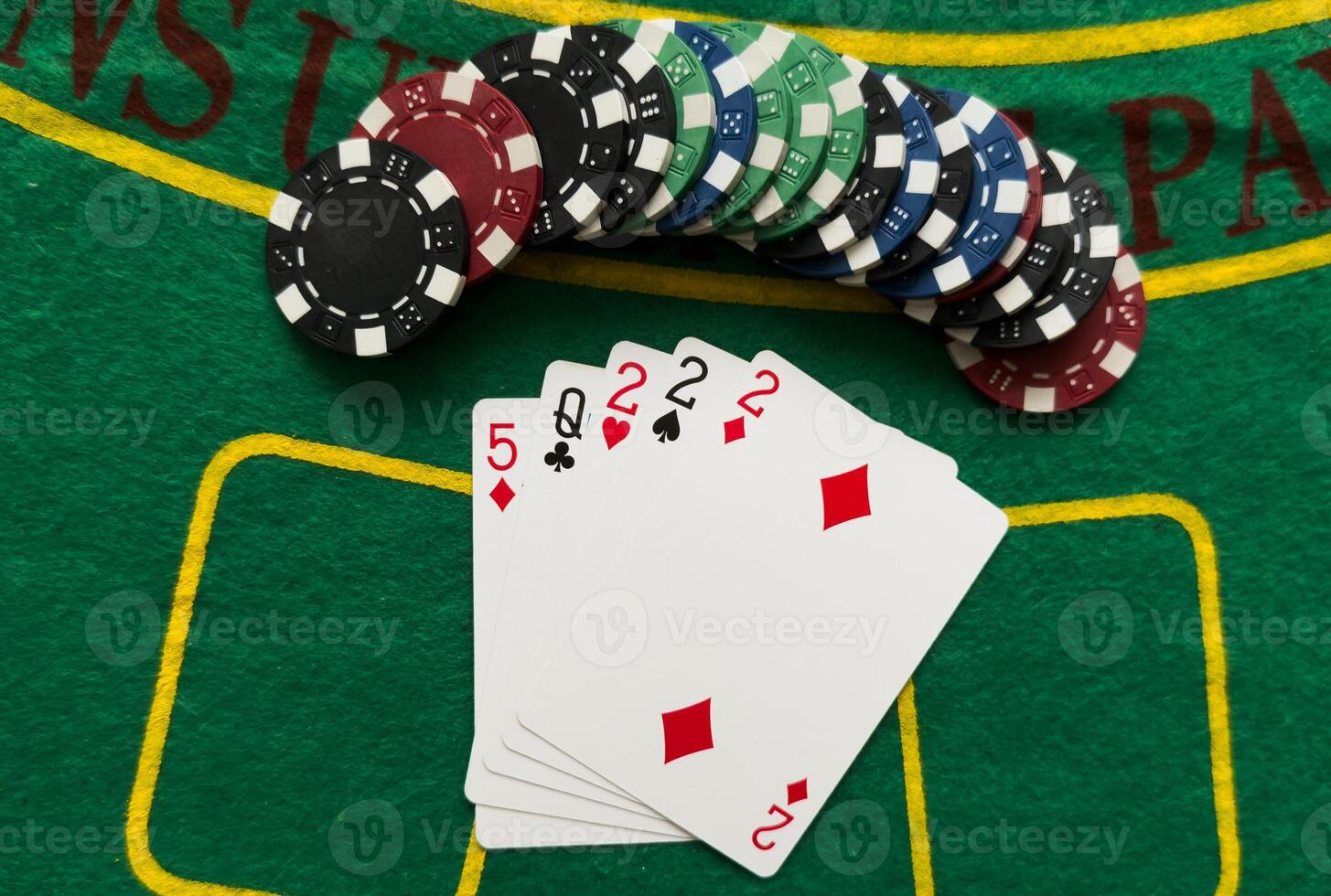 Chips are colored for poker and playing cards on the poker table. poker. casino. win. photo