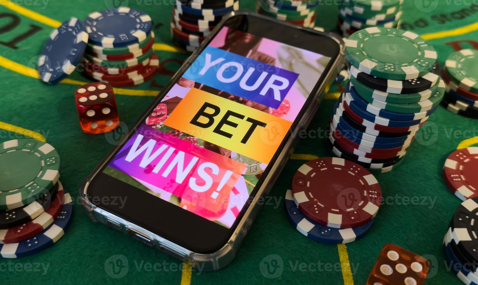 Smartphone, money, playing cards and chips. Online casino photo