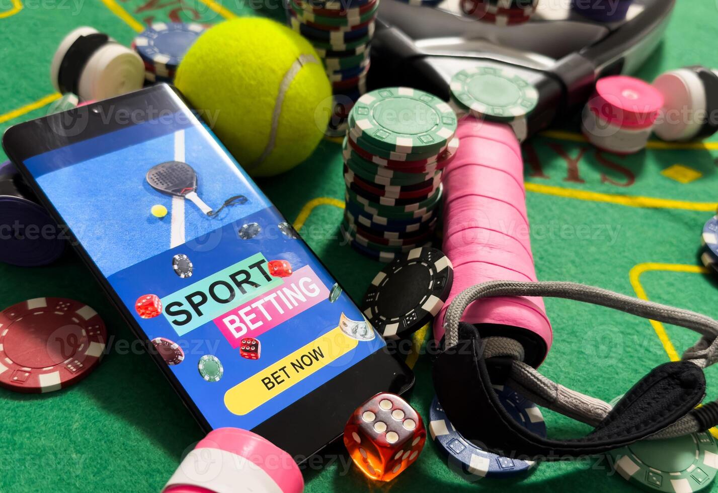 padel tennis and sports betting on a smartphone. Concept of sports bet photo