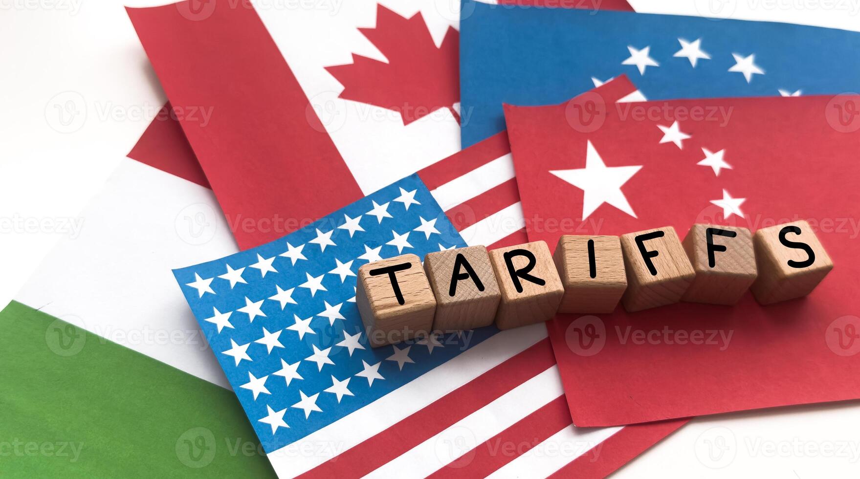 wooden cube block for tariffs on China flag and US flag.It is symbol of economic tariffs trade war and tax barrier between United States of America and China. photo