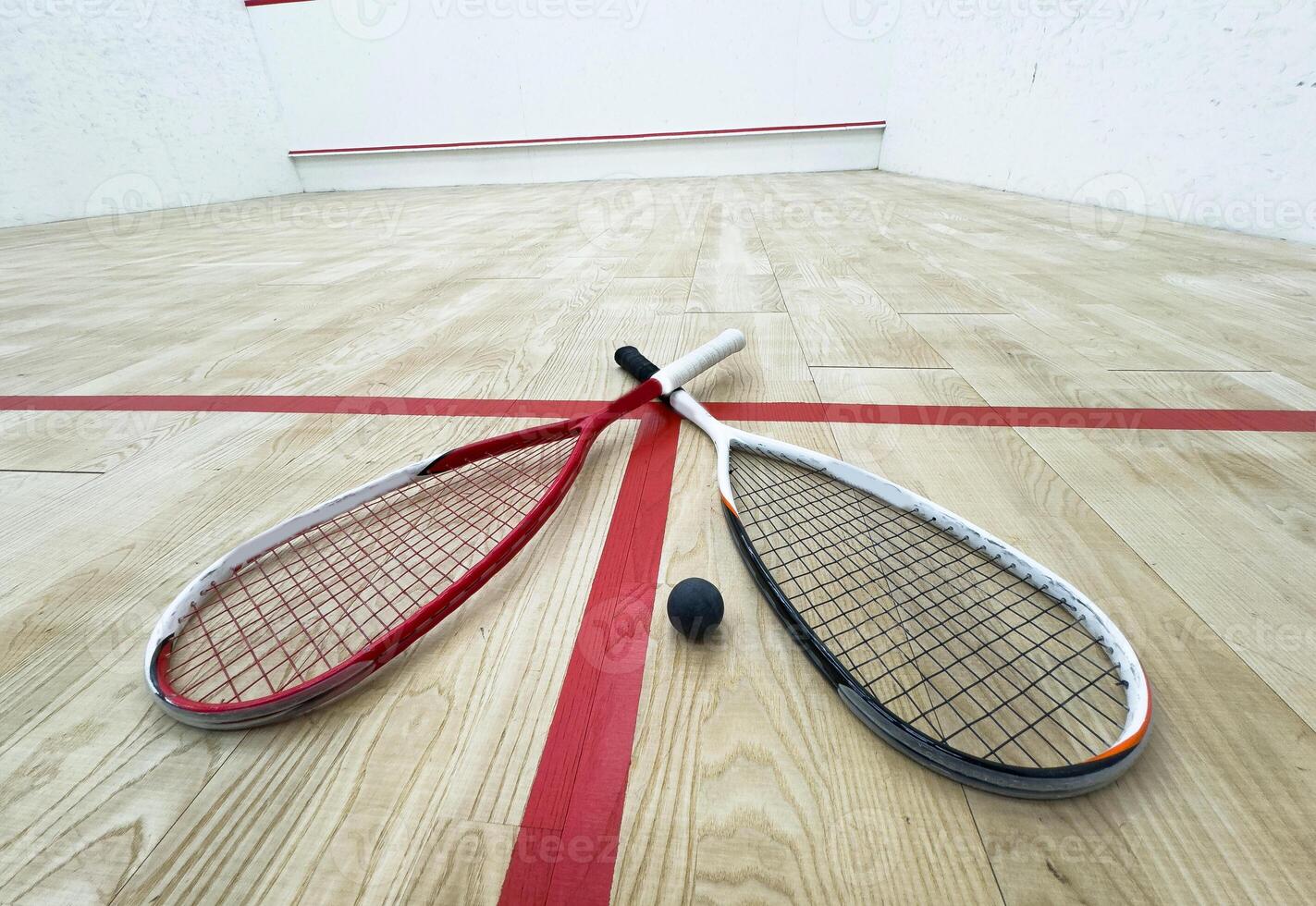 Squash Racket and Ball Sport Played by Two or Four Players. Court Floor and the Rockets photo