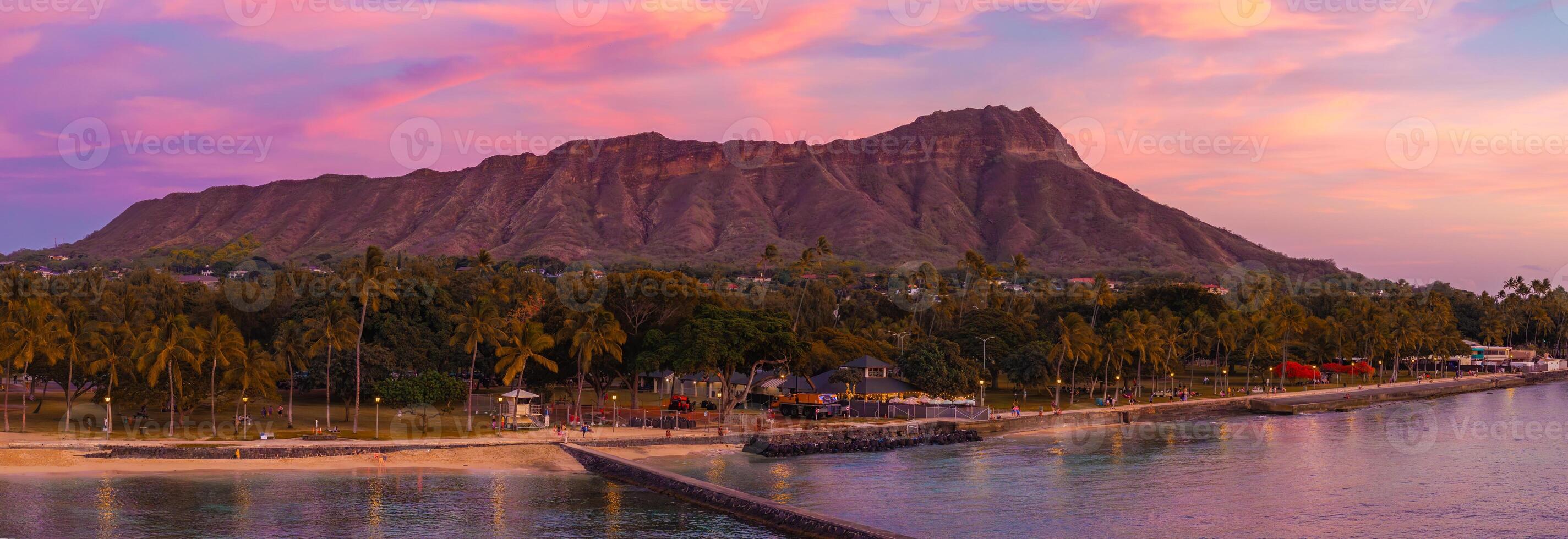 Diamond Head Crater and Beach at Sunset on Oahu Island, Hawaii photo