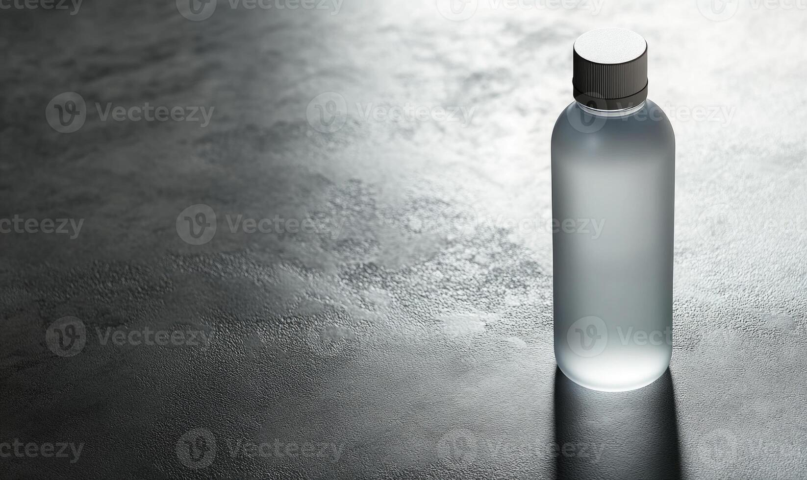 A clear bottle of water is sitting on a counter photo