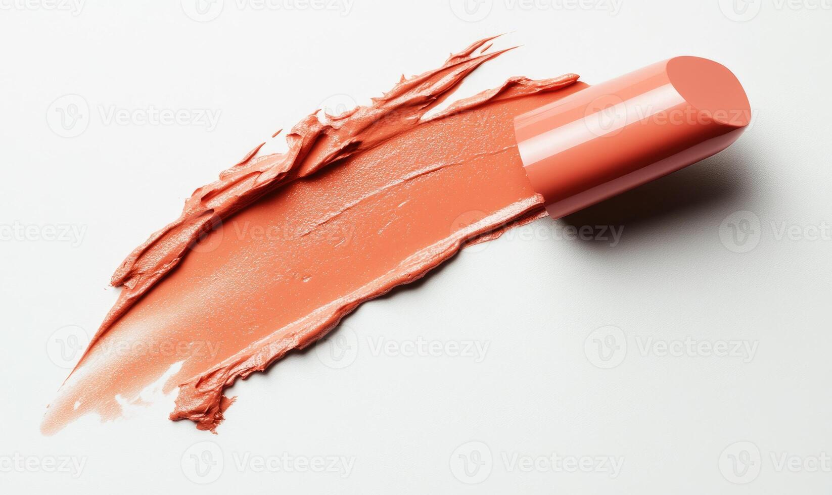 A tube of lipstick is on a white background photo