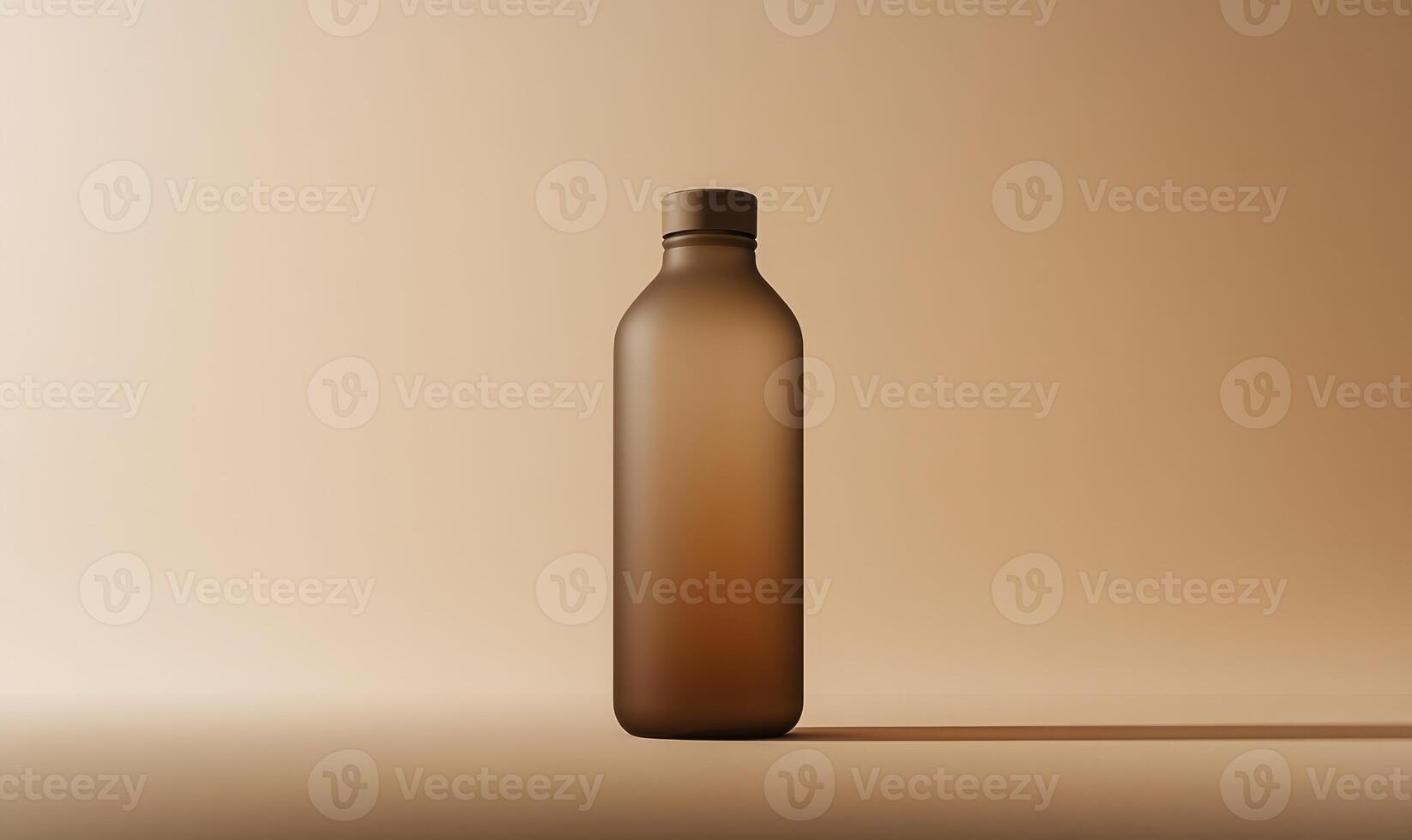 A bottle of brown liquid is sitting on a tan background photo