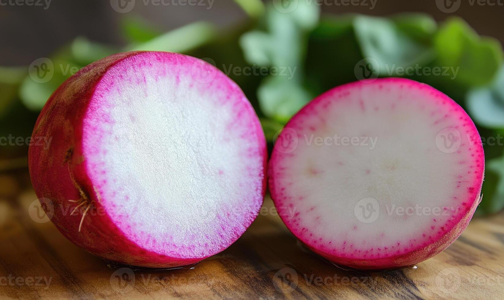 A piece of radish is cut in half photo