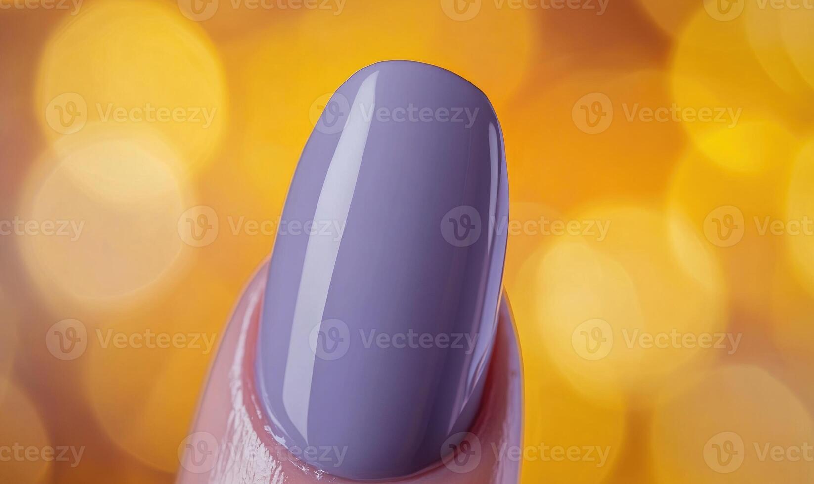 A purple nail polish bottle with a purple nail polish on a fingernail photo