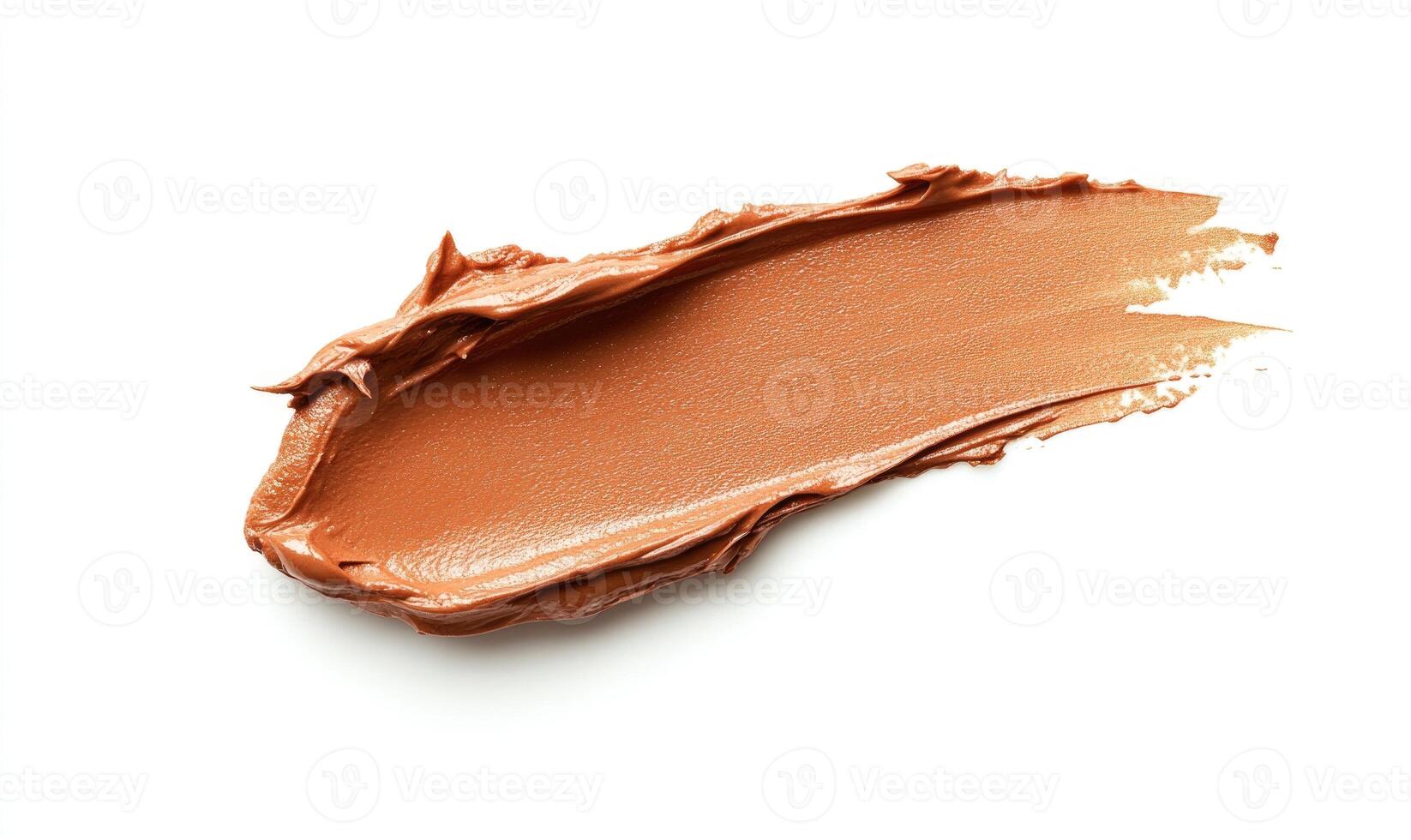 A brownish color lipstick is shown on a white background photo