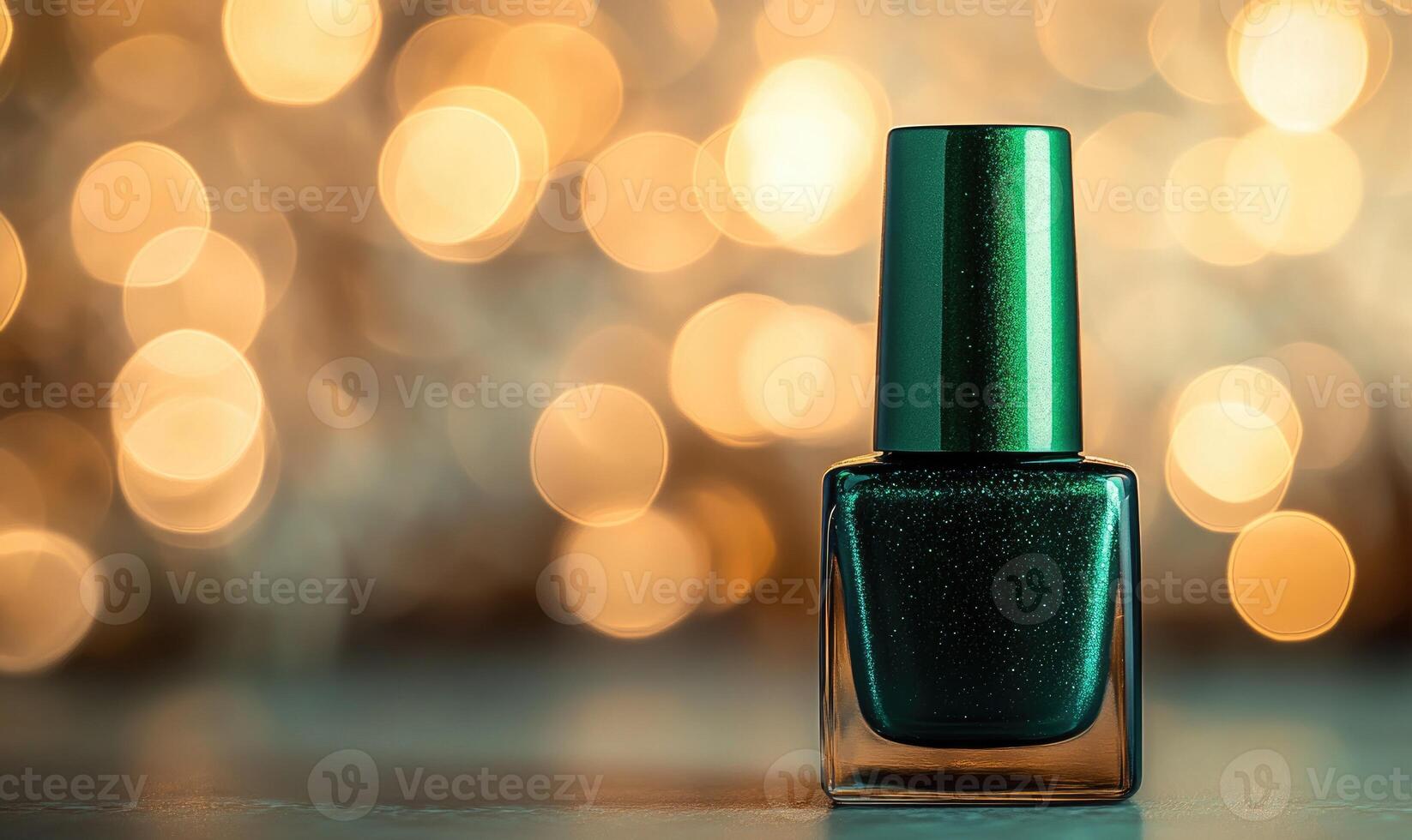 A green nail polish bottle with a green cap photo