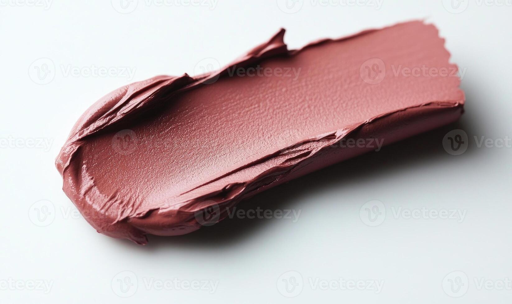 A tube of lipstick is shown with a white background photo
