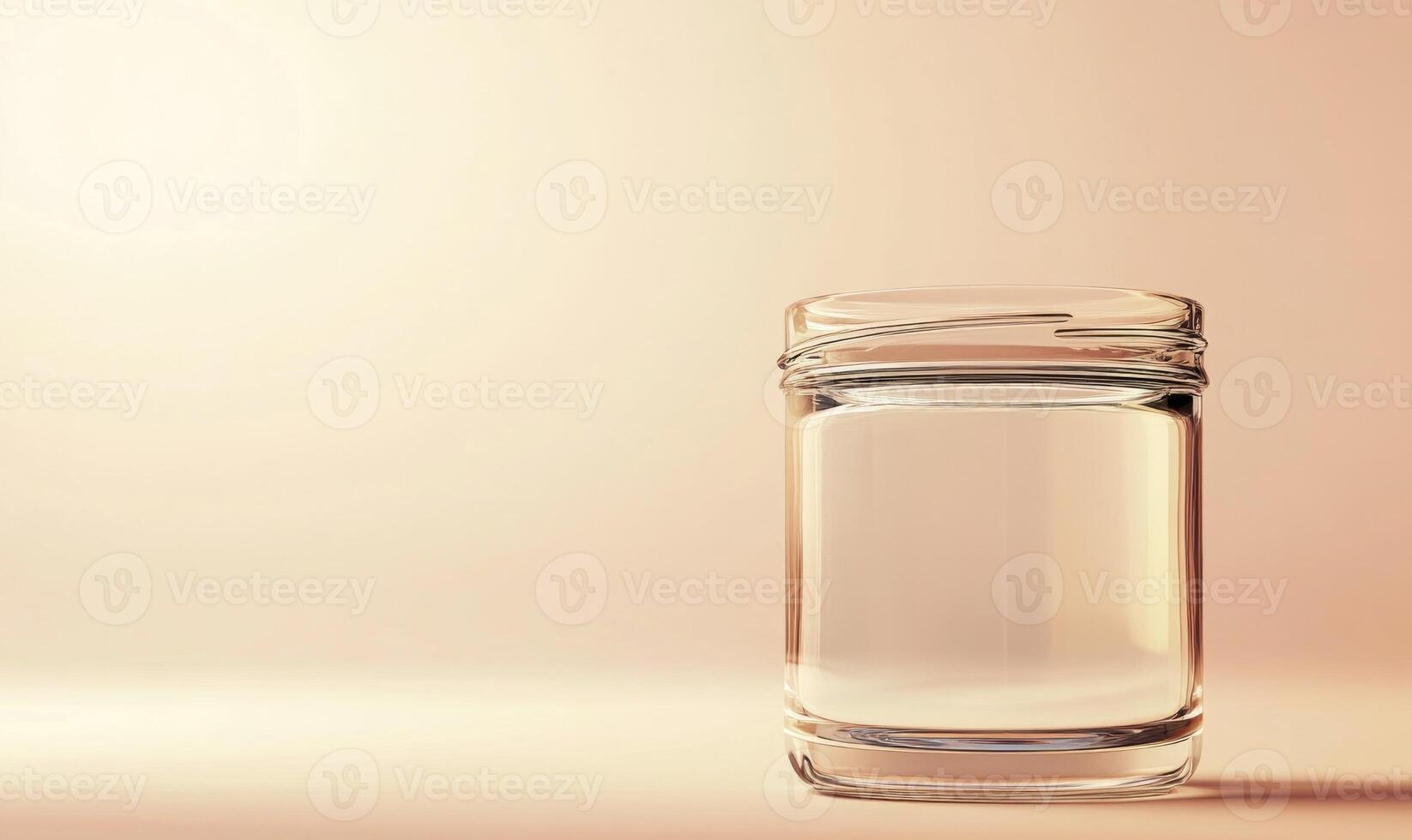 A glass jar is sitting on a table photo