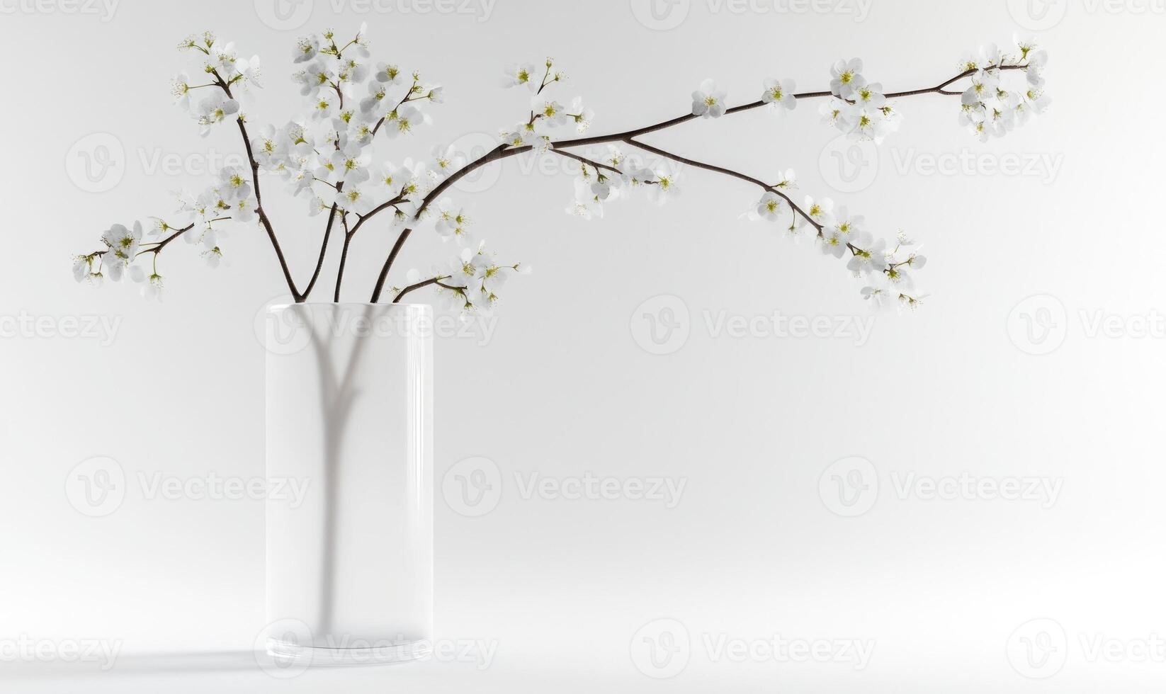 A vase with a tree branch in it photo