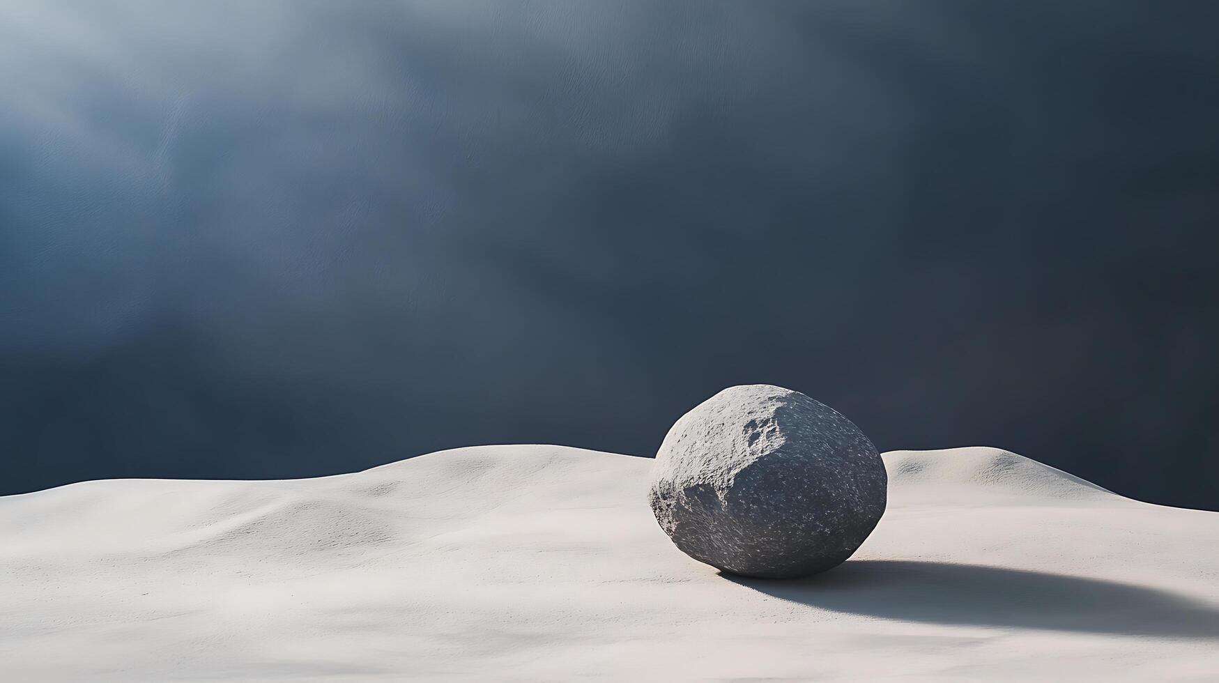 A solitary rock rests on a dune under a dark sky. A sense of isolation and stark beauty in a minimalist landscape. photo