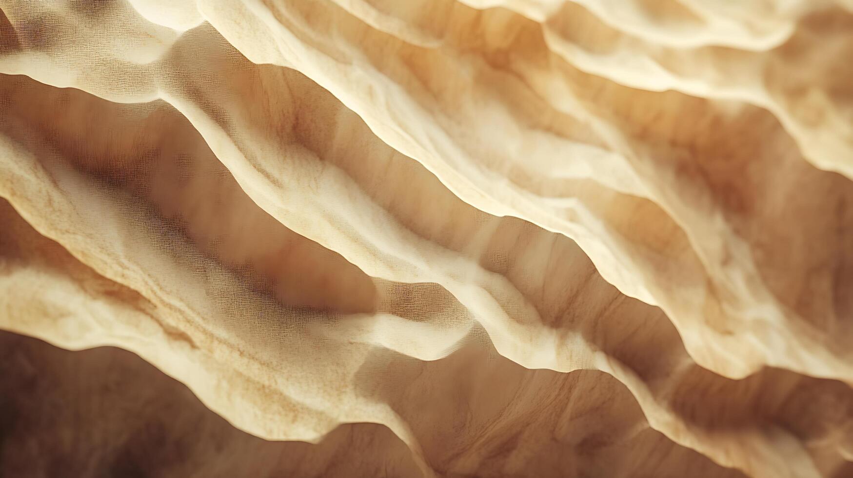 Abstract pattern of dunes. Light catches the sand with a dynamic contrast of shadow and light, the rippled desert landscape in abstract. photo