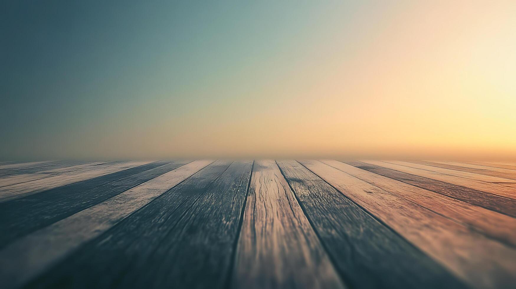 Wooden planks lead to a soft, diffused horizon under a gradient sky. An inviting platform with potential for a variety of uses. photo