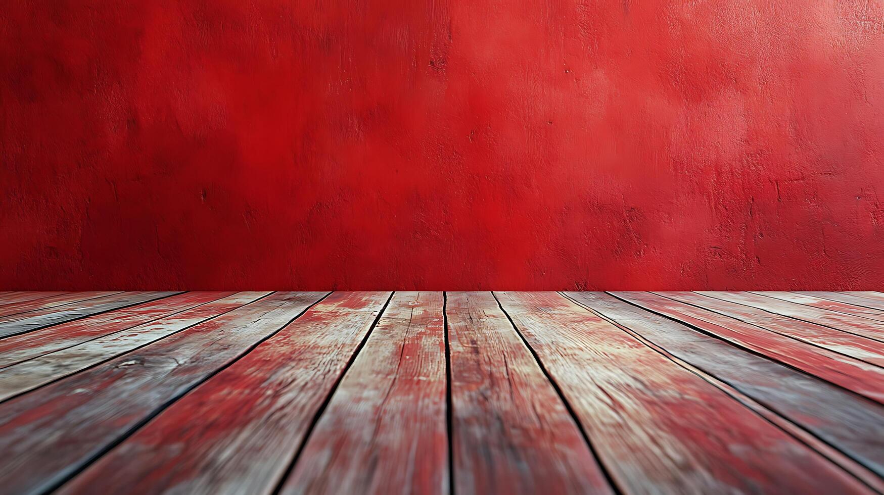 Textured red wall background with a worn wood floor, providing a rustic and dynamic visual element. Great backdrop for various purposes. photo