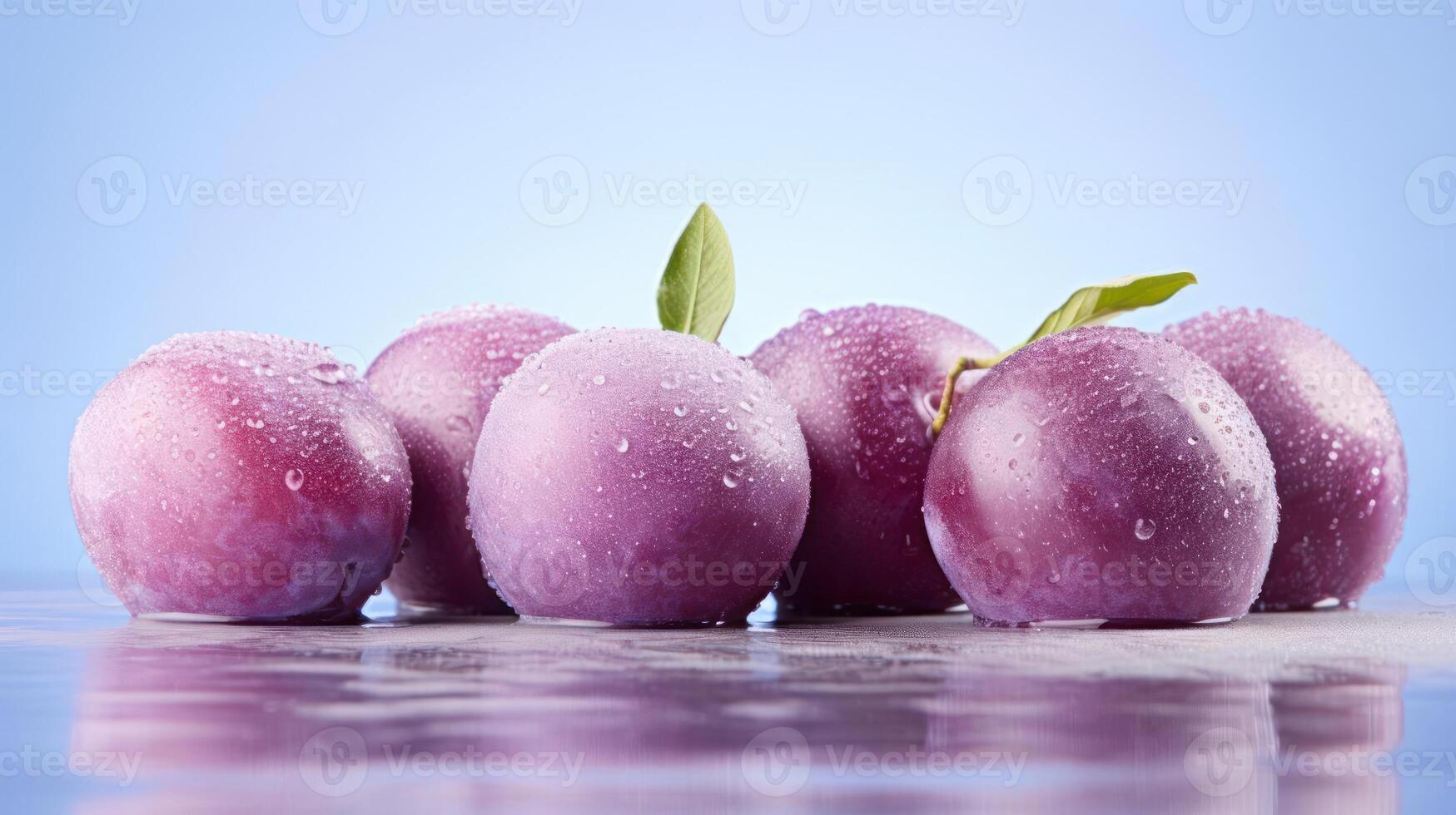 Fresh plums with water drops on them photo