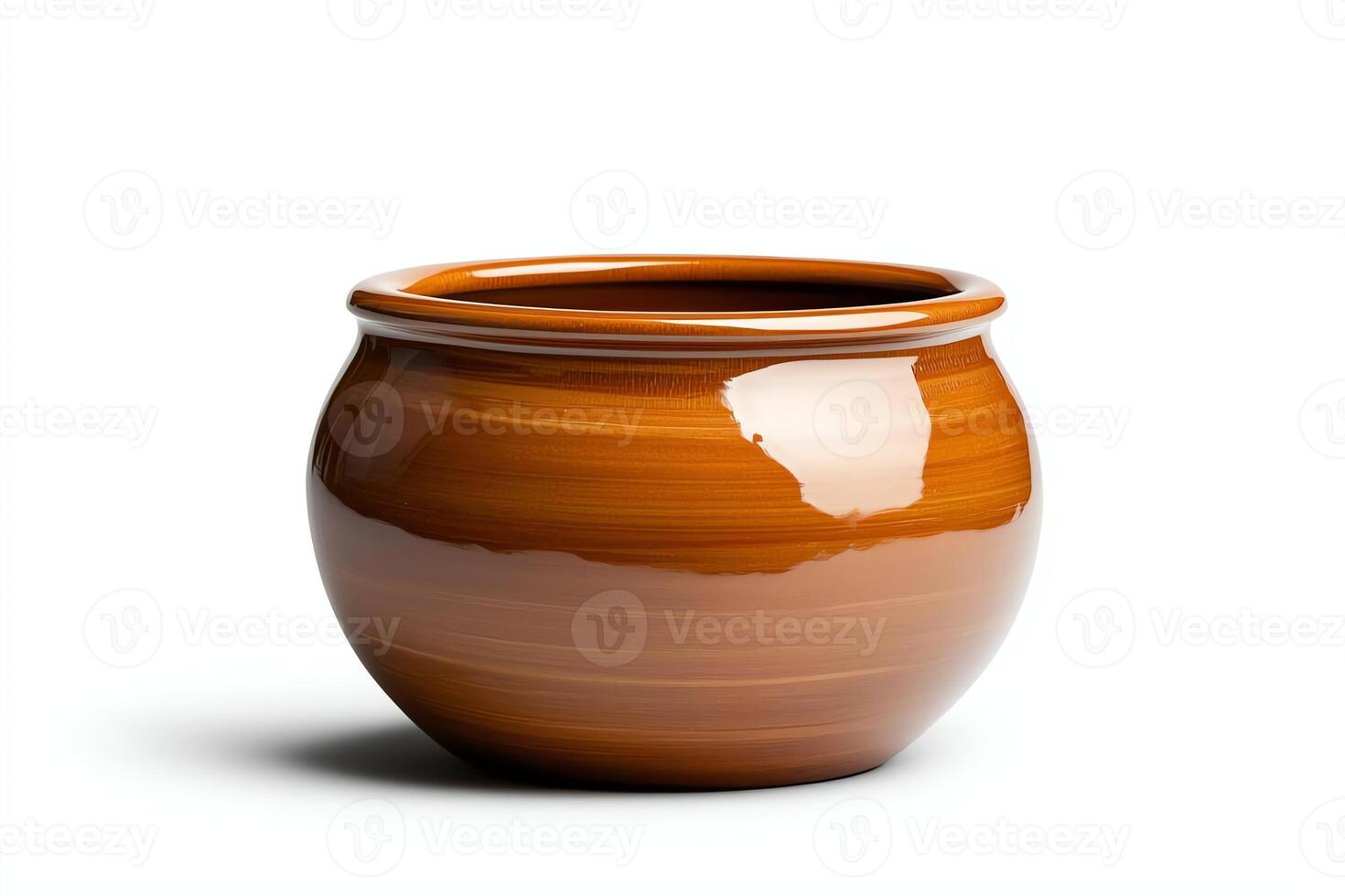A beautifully crafted ceramic pot, showcasing a rich, glossy finish. This versatile piece serves as a perfect decor item or functional container, ideal for home or garden use. photo