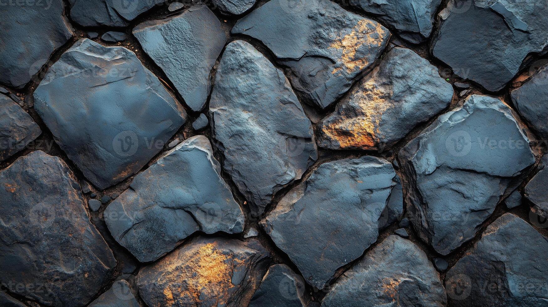 A stone wall with a black background photo