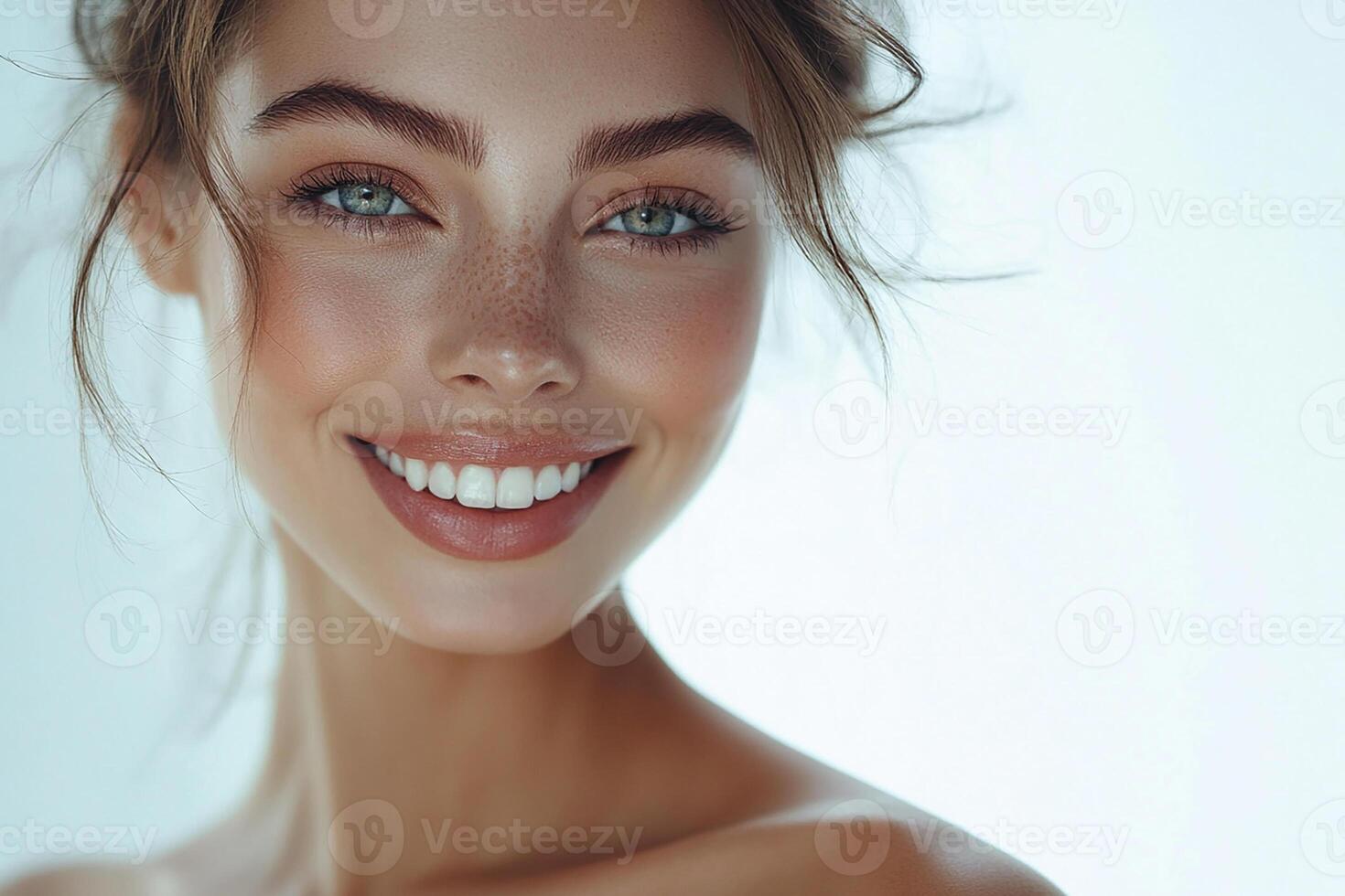 A beautiful woman with bright blue eyes photo