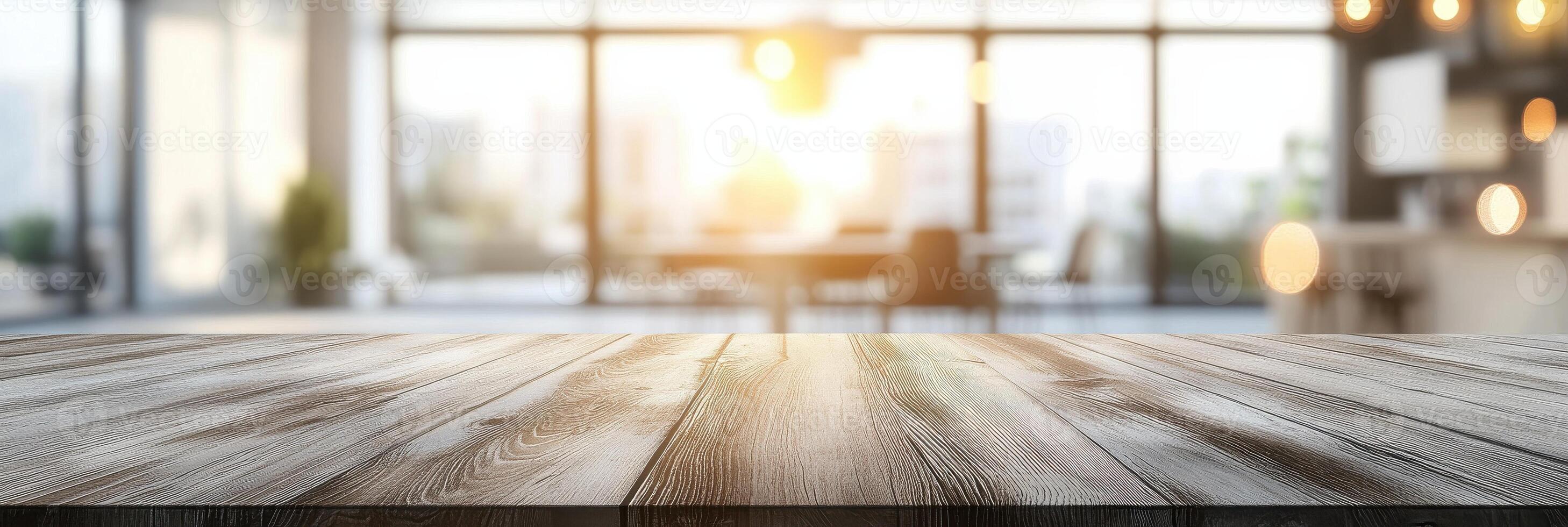 Empty wooden table in a bright modern office suitable for product display photo