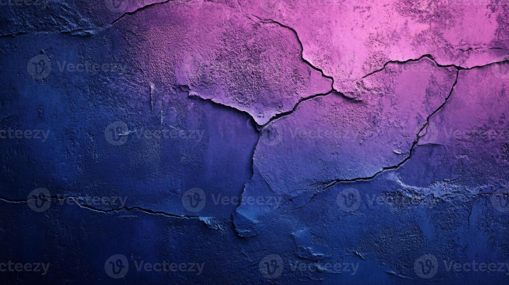 Distressed vibrant wall texture revealing cracks and gradients in blue and purple tones photo