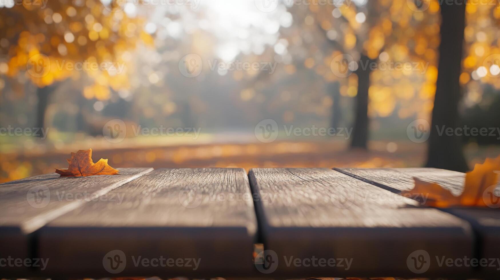 Tranquil autumnal tableau showcasing golden foliage viewed from a wooden platform perspective photo