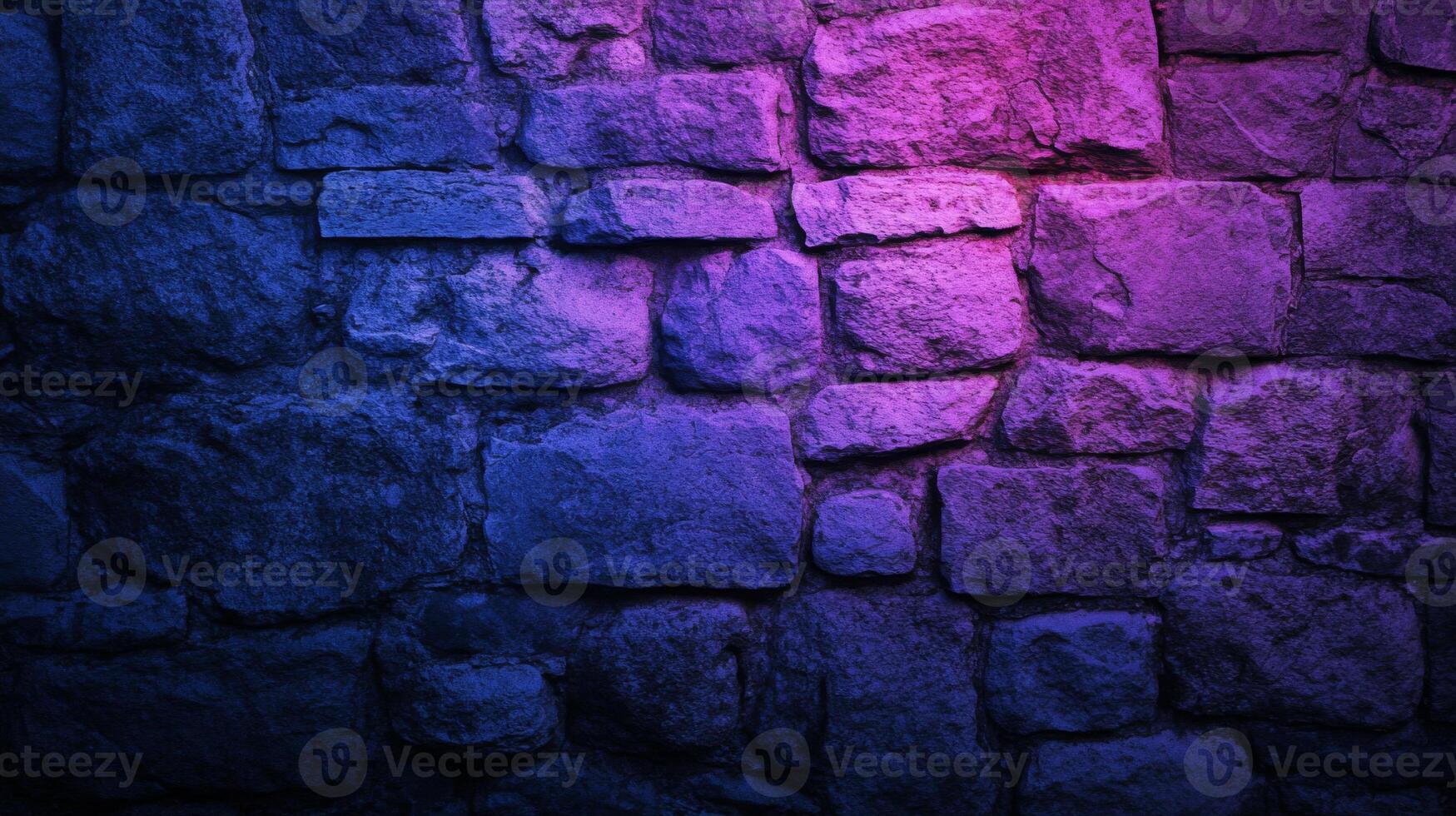 Illuminated stone wall texture showcasing captivating pink and blue gradient lighting effects photo