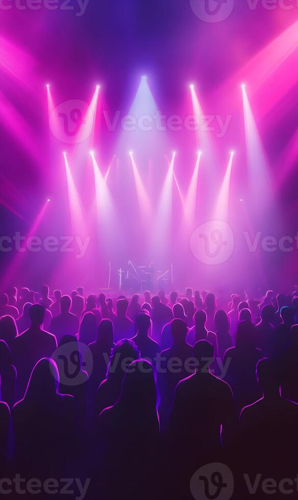 Captivating Audience Engaged at a Live Music Concert Under Vibrant Stage Lighting photo