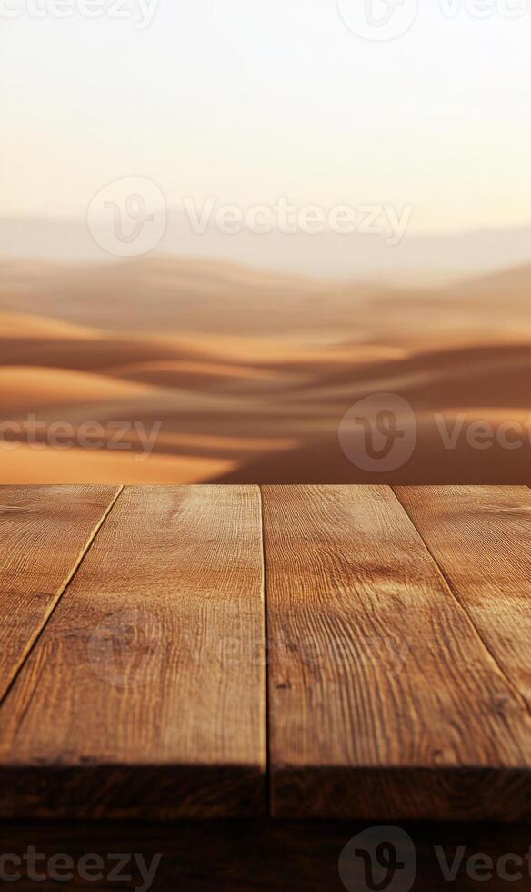 Wooden tabletop surface with a blurred desert landscape background and warm lighting hue photo