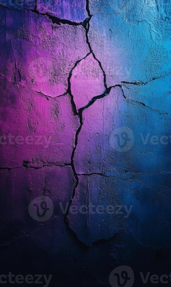 Cracked concrete texture with vibrant neon gradients illuminating abstract patterns photo