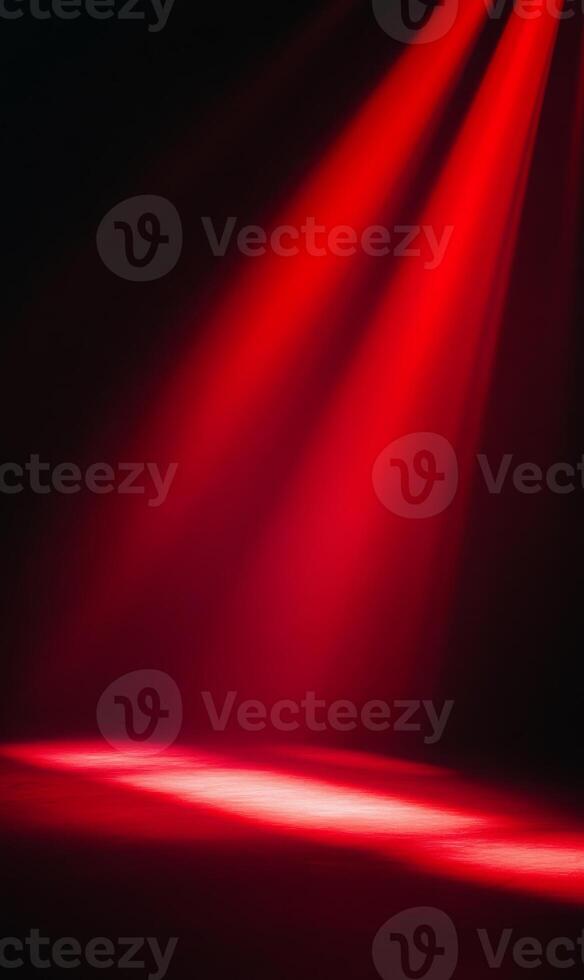 Dramatic illumination design with converging crimson beams on dark backdrop creates a strong focus photo