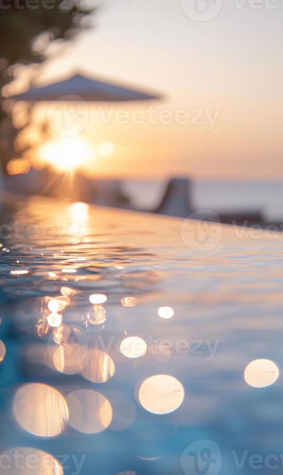 Tranquil infinity pool reflecting a vibrant sunset, creating a serene and inviting atmosphere photo