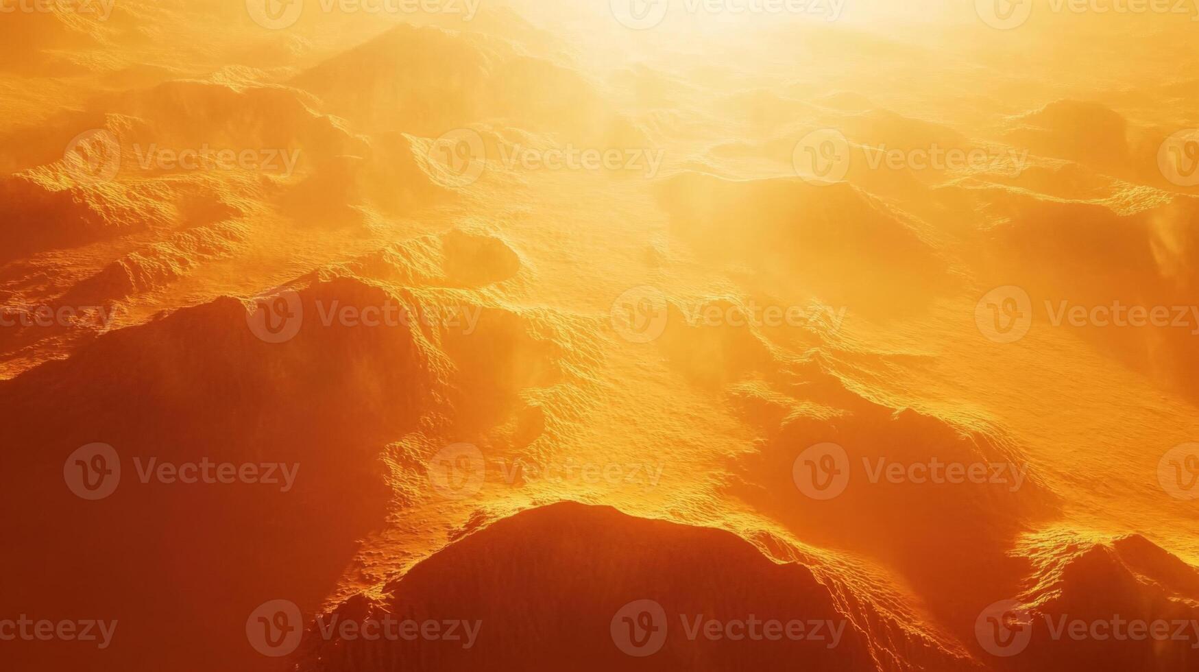 Golden hued textured mountainscape aerial perspective with radiant sunlit atmosphere photo
