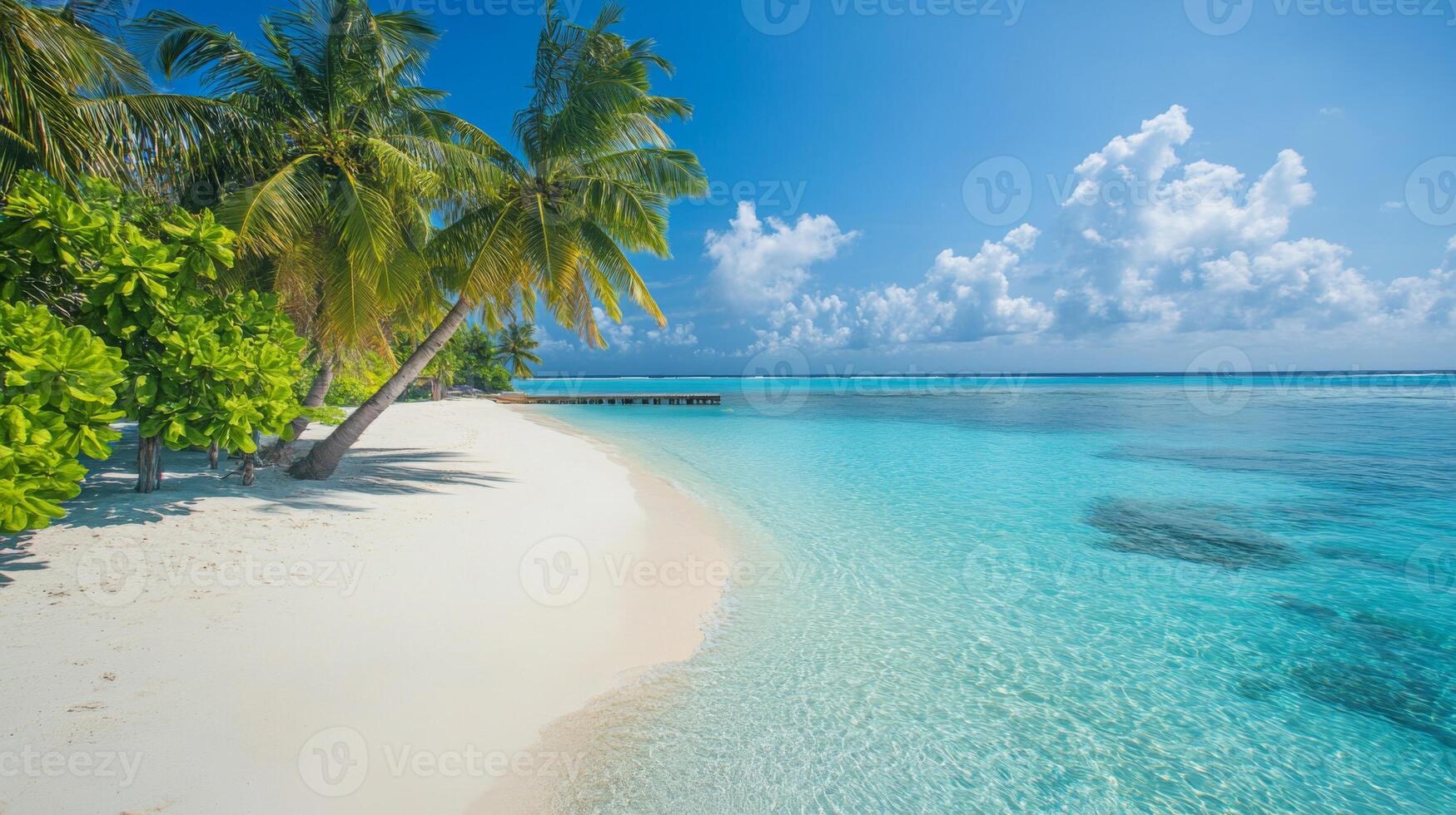 Idyllic tropical beach view with turquoise waters and swaying palm trees under blue sky photo