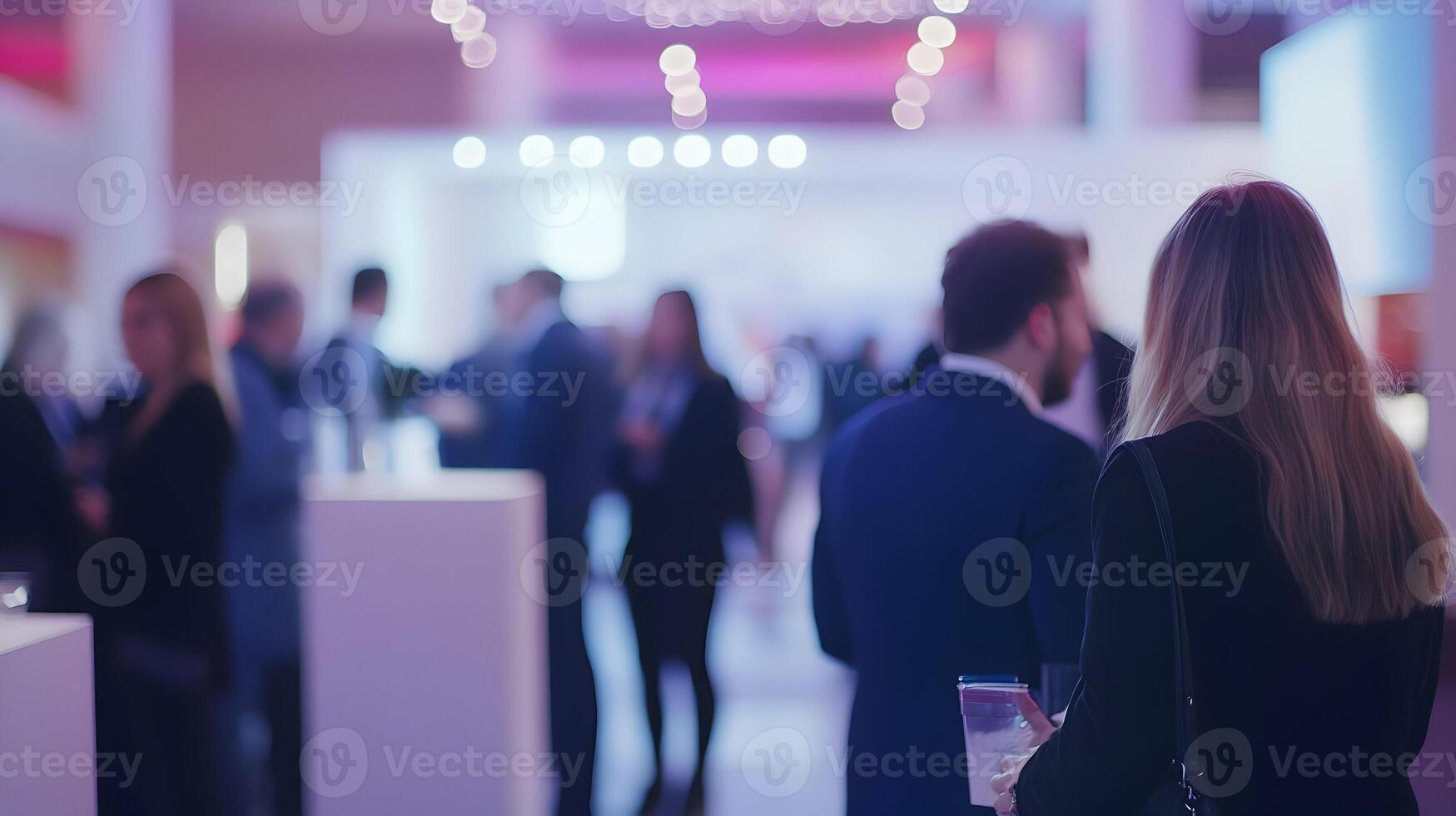 Blurred view of a business conference, networking event with diverse professionals photo