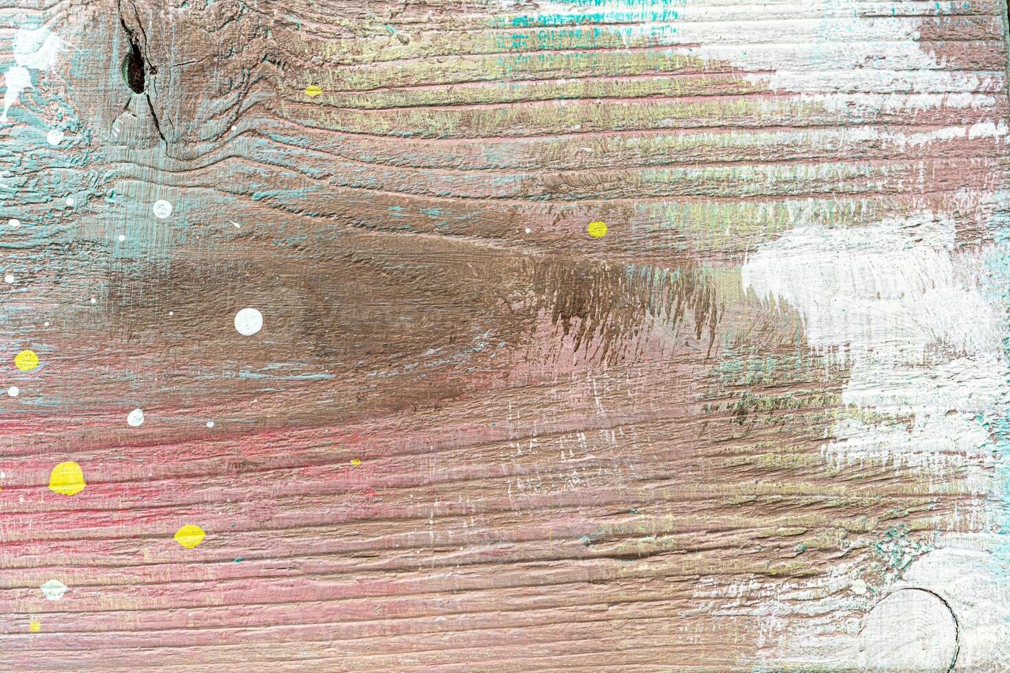 Painted textured wooden plank with a paint stains. Abstract backdrop for design. photo