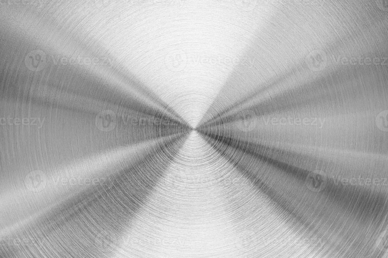 Stainless steel or aluminium circular brushed metal texture. Abstract background. Circle shape. photo