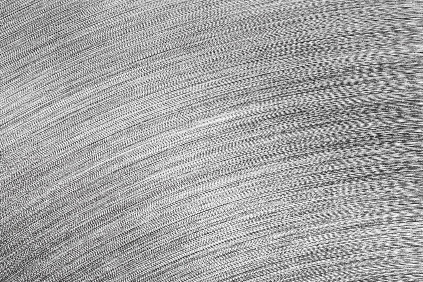 Monochrome texture of shiny scratched metal. Design element. photo