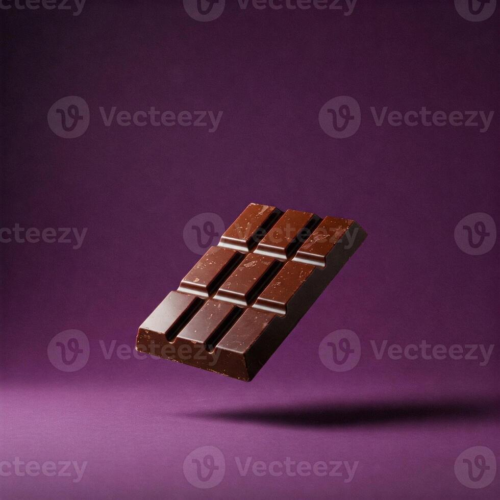 A chocolate bar on a purple background photo