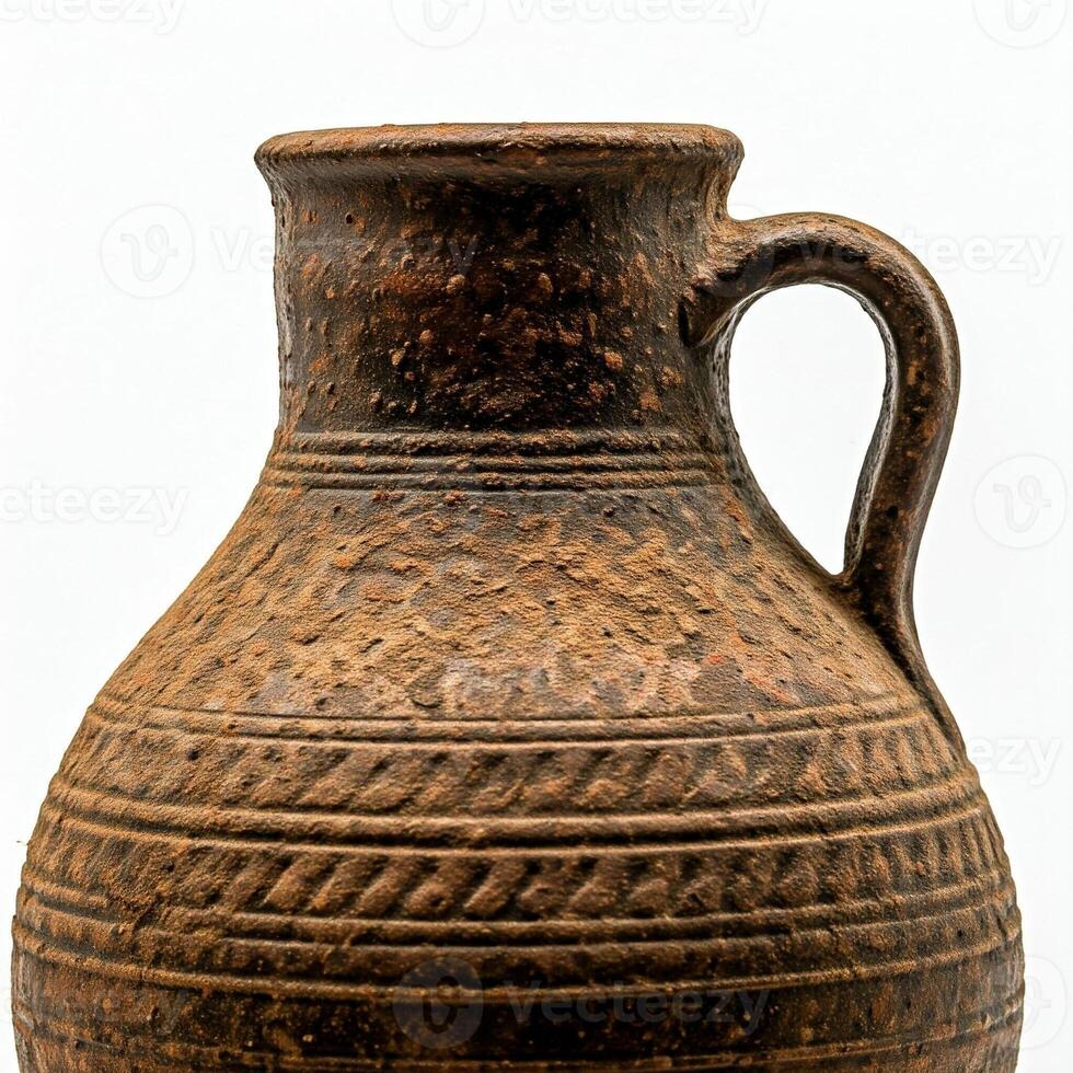 A brown vase with a handle photo