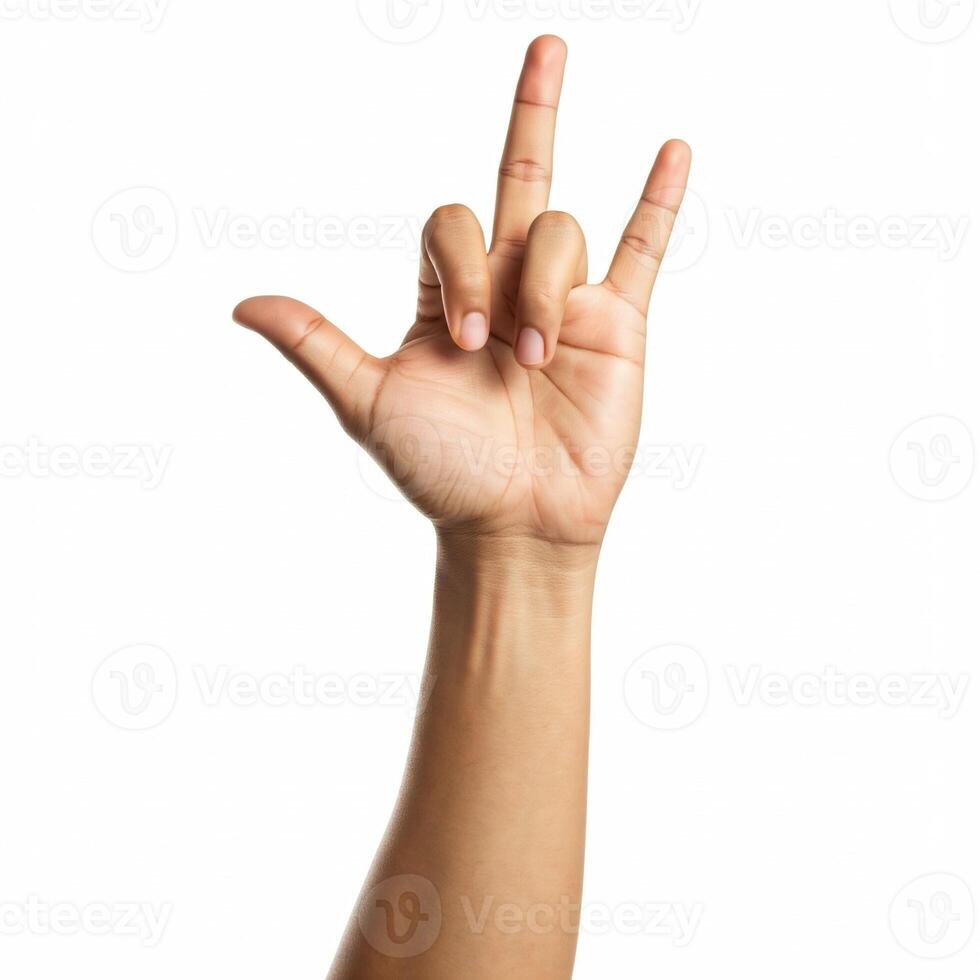 A person is making the sign for two with their hand photo