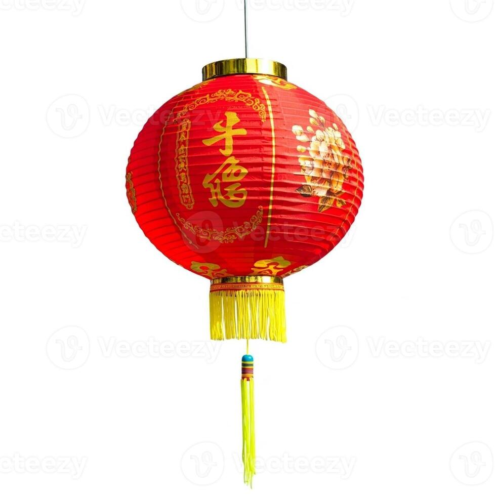 A red chinese lantern with gold trim and a yellow tassel photo