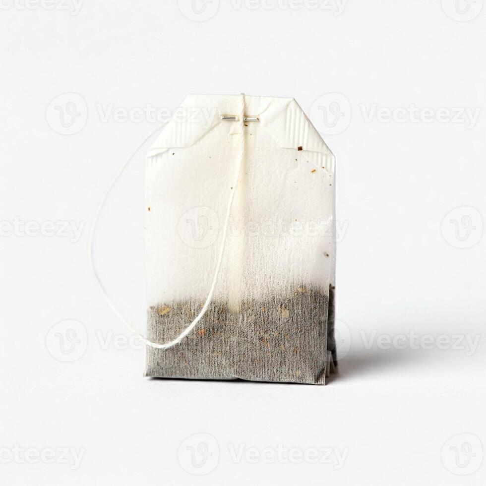 A tea bag with a white string on it photo