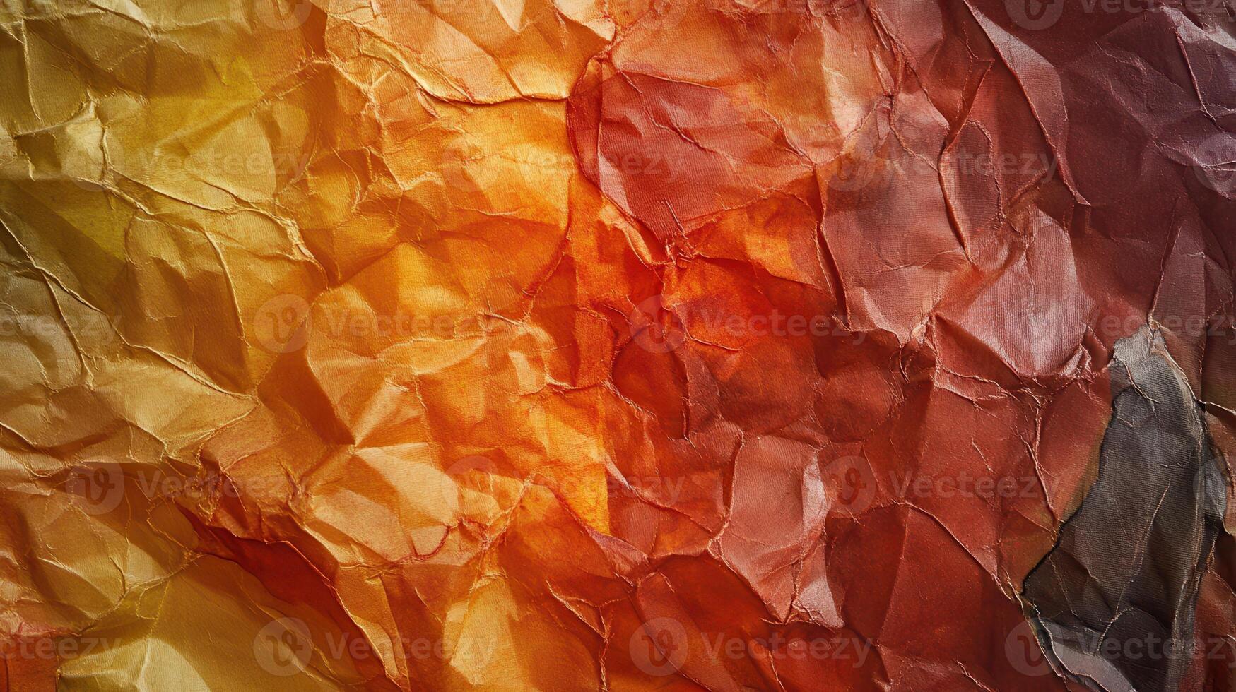 Crumpled autumn-toned paper texture background photo