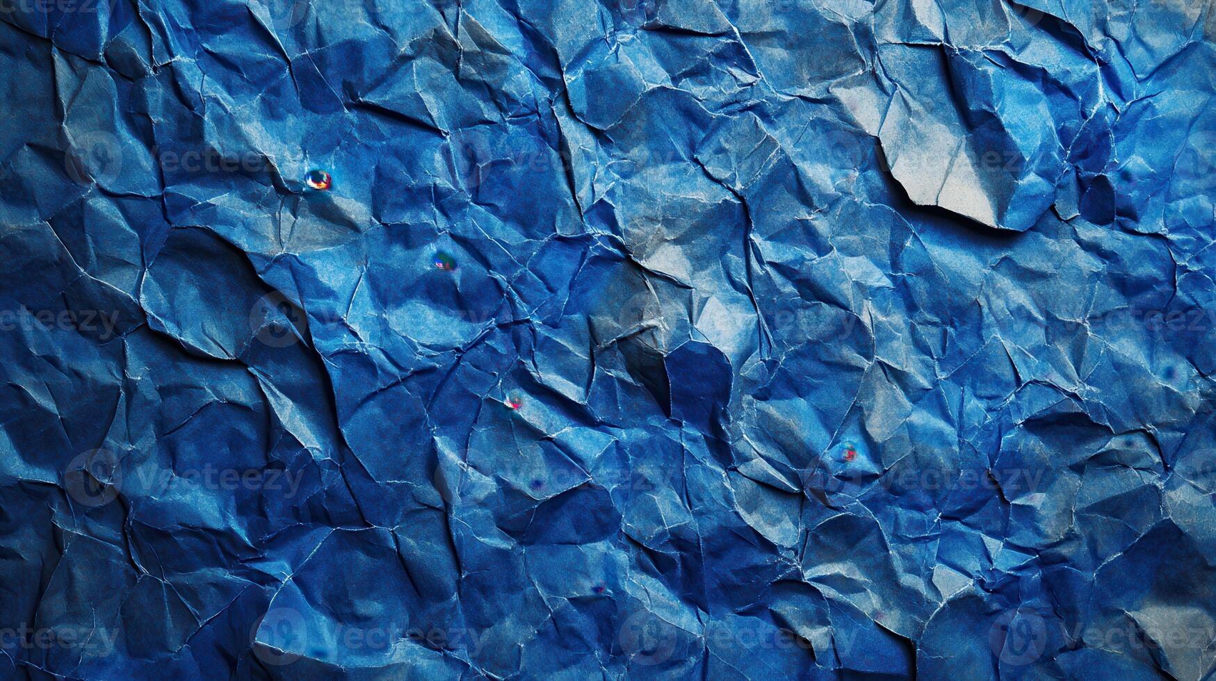 Crumpled blue paper texture background, scattered pins photo