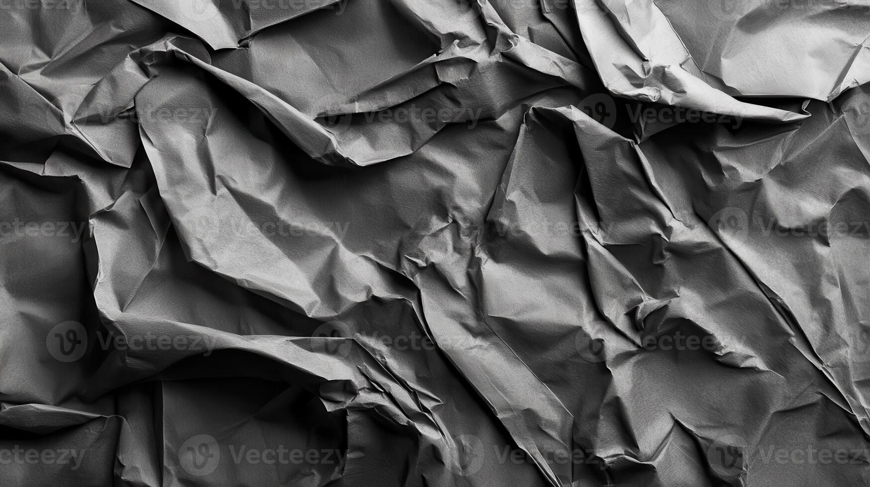 Crumpled dark paper texture, background, design photo